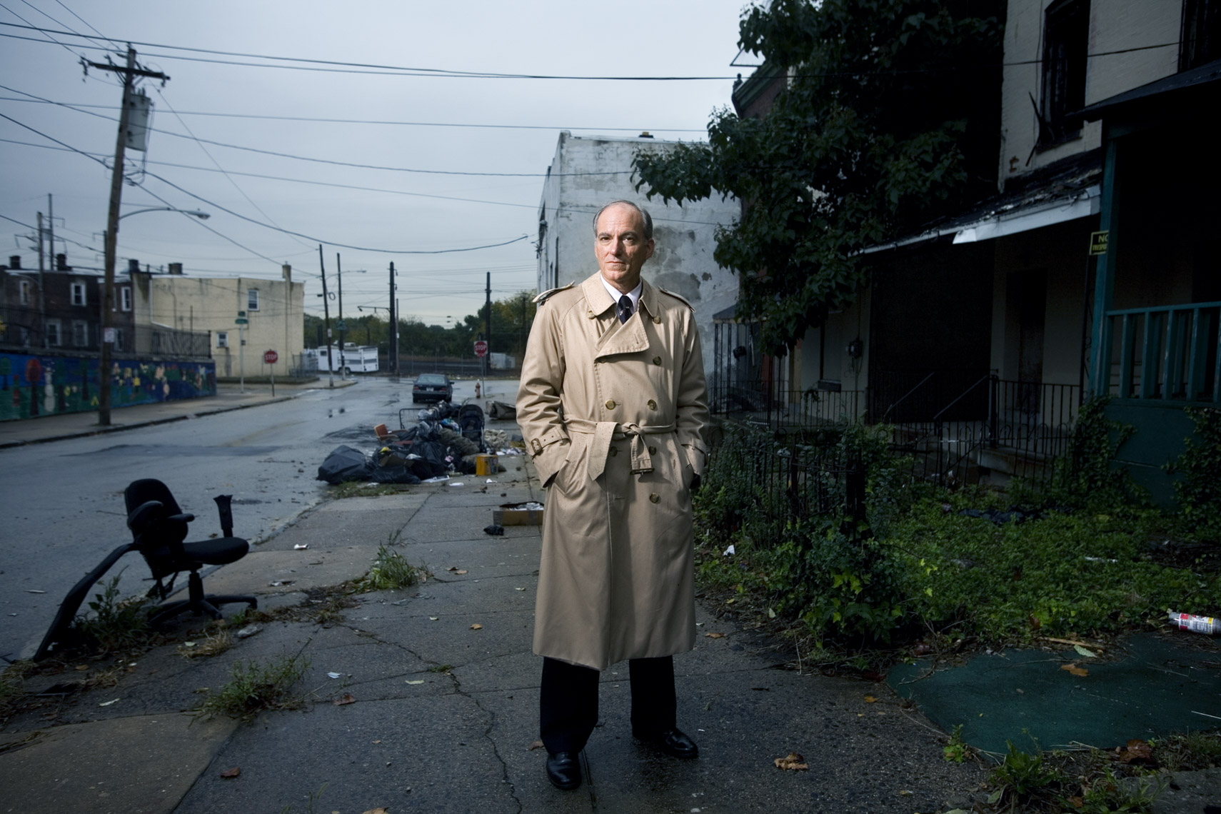 Portrait of a criminologist in a rundown urban neighborhood  by Washington DC photographer Ryan Donnell